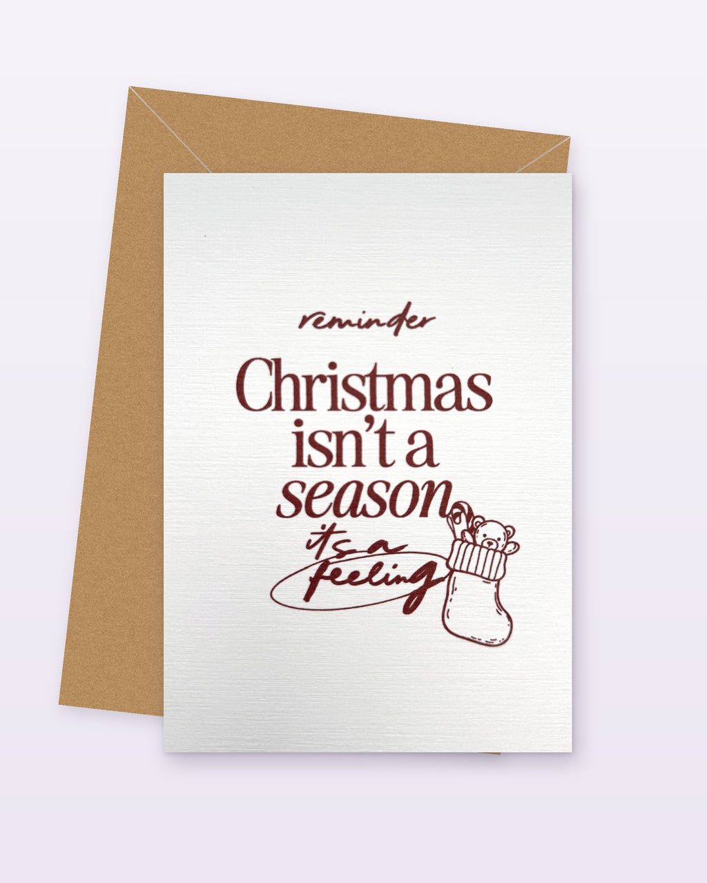 Weihnachtskarte Christmas Isn't a Season mit Socke und Teddy